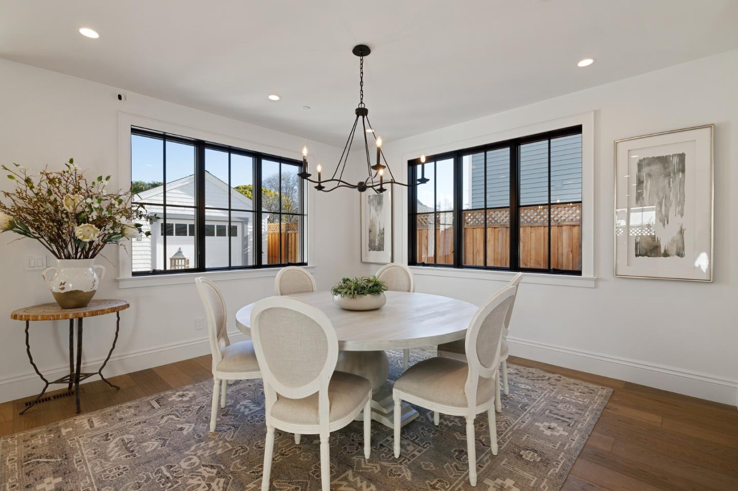 228 Stanley Road Burlingame, CA 94010 - Photo 24 of 100 a dining room with furniture window and wooden floor