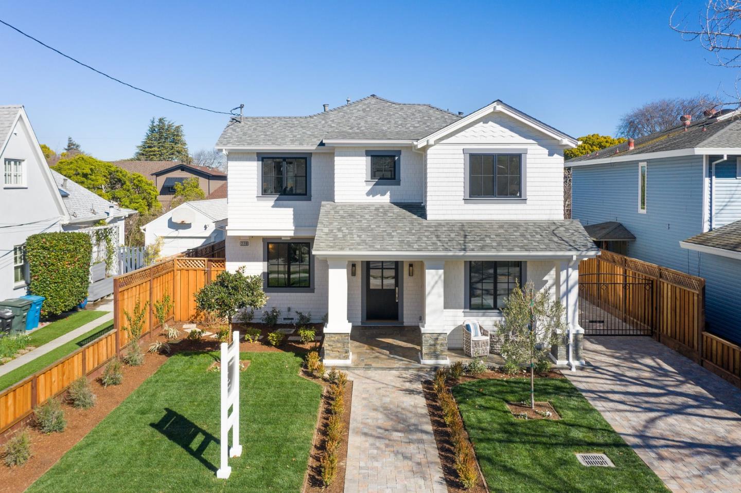 228 Stanley Road Burlingame, CA 94010 - Photo 5 of 100 a front view of a house with a yard