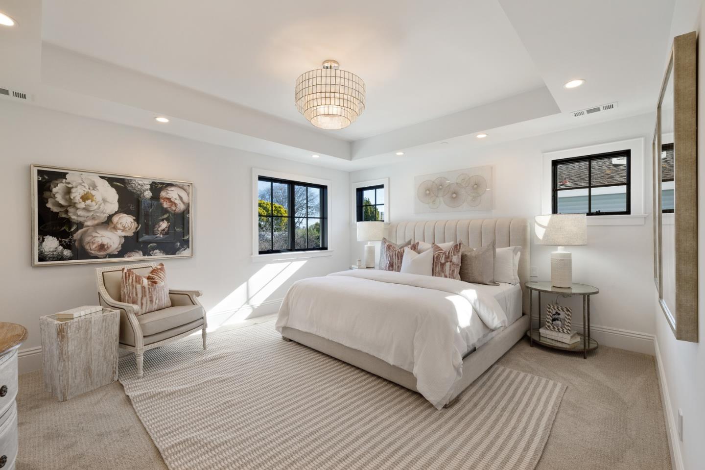 228 Stanley Road Burlingame, CA 94010 - Photo 59 of 100 a bedroom with a bed and a chandelier