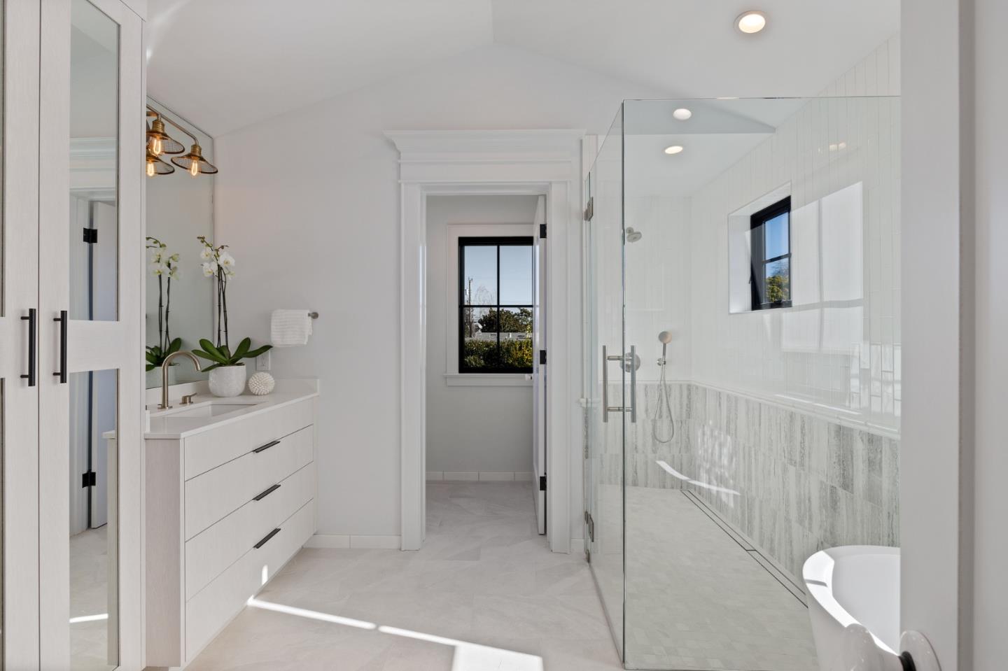 228 Stanley Road Burlingame, CA 94010 - Photo 65 of 100 a bathroom with a shower and a sink