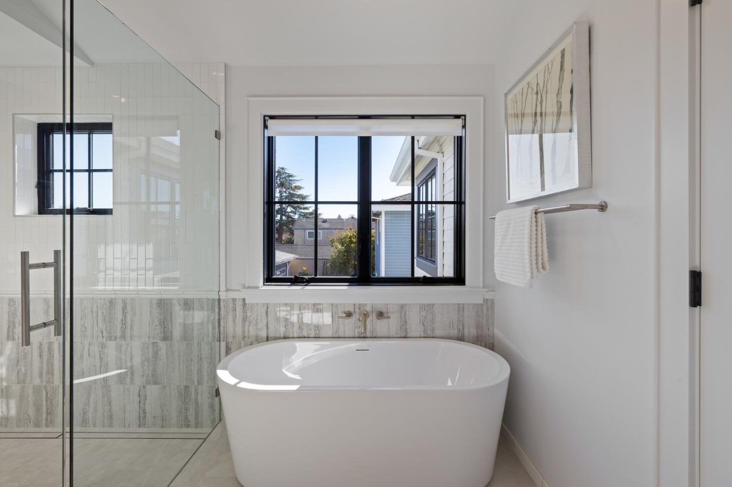 228 Stanley Road Burlingame, CA 94010 - Photo 69 of 100 a white bath tub sitting next to a shower
