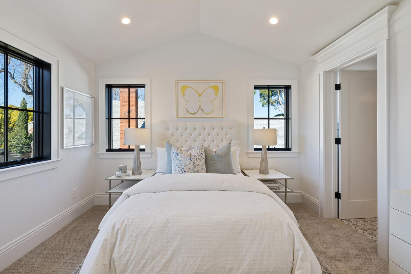 228 Stanley Road Burlingame, CA 94010 - Photo 71 of 100 a bedroom with a bed and a painting on the wall