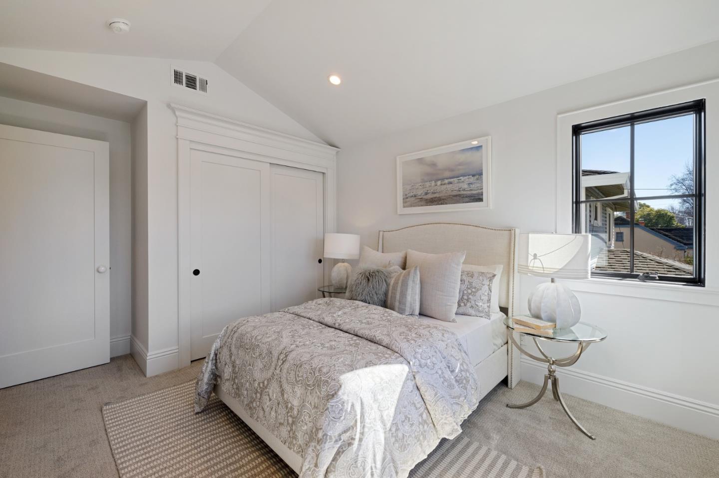 228 Stanley Road Burlingame, CA 94010 - Photo 79 of 100 a bedroom with a bed and large window