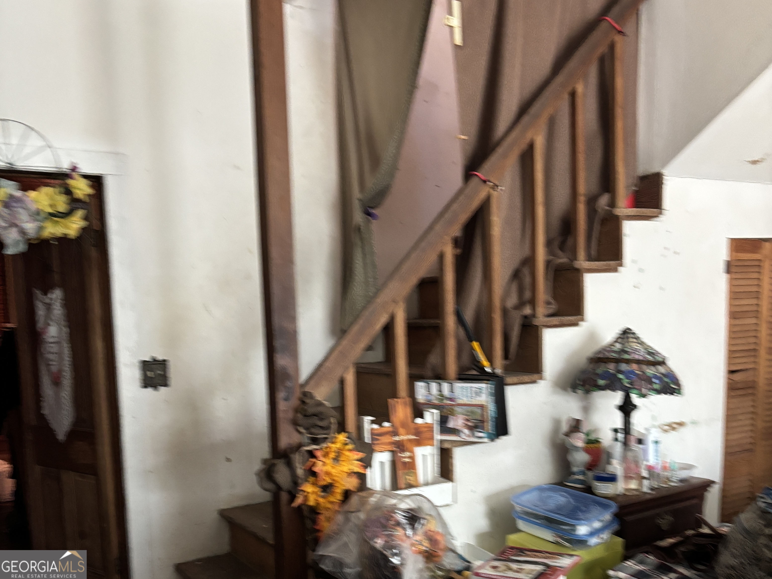 13272 Florida Avenue St. George, GA 31562 - Photo 12 of 16 a view of entryway and hall with wooden floor