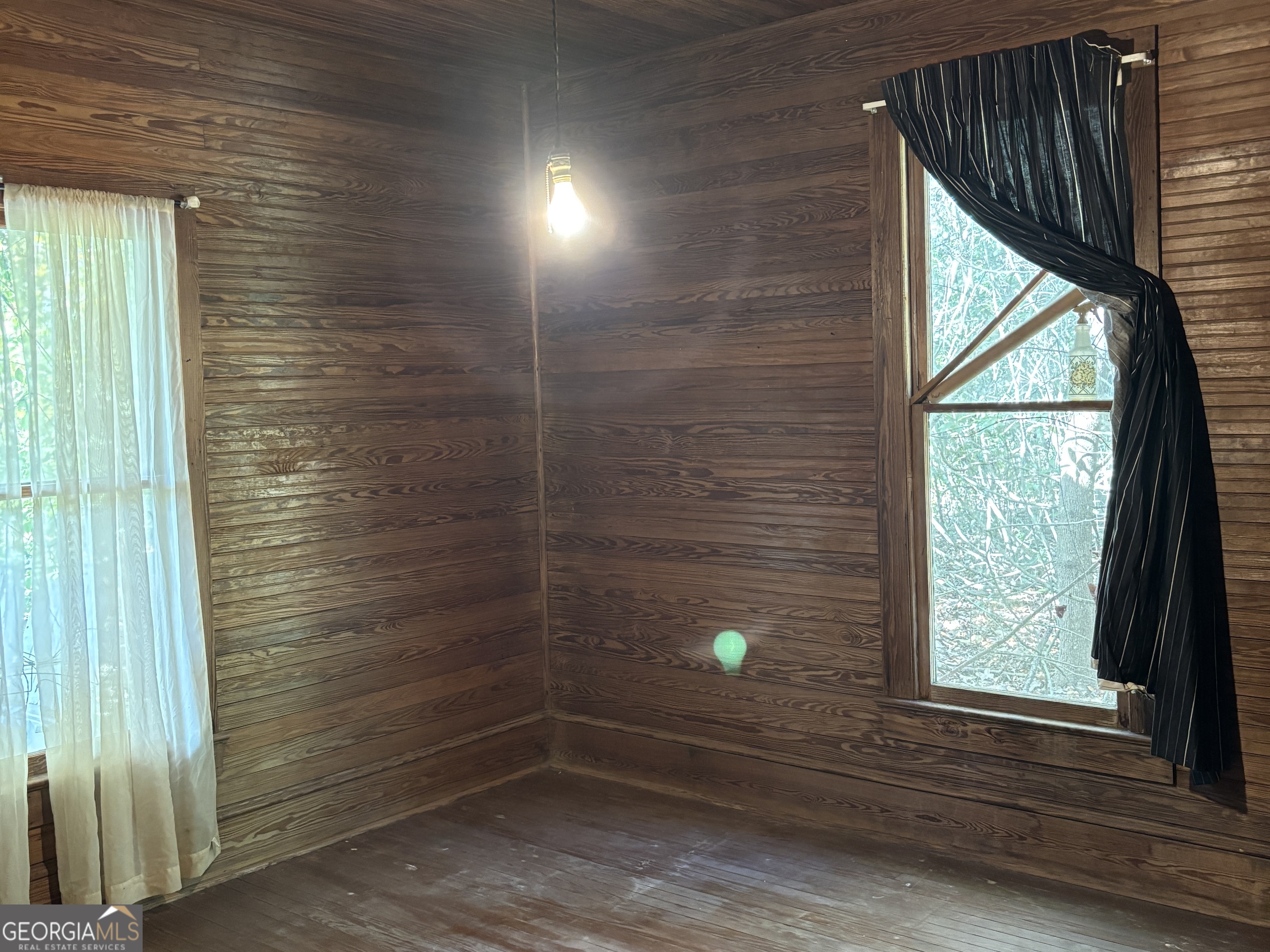 13272 Florida Avenue St. George, GA 31562 - Photo 6 of 16 a view of a door and a window