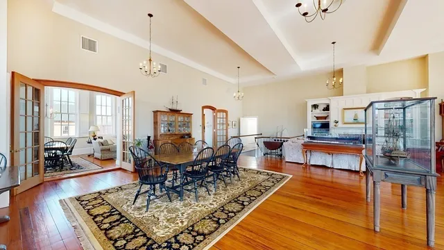 a living room with furniture and a table