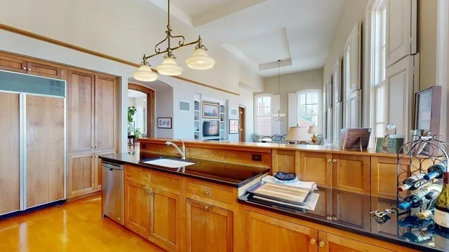 a view of kitchen with furniture and a window