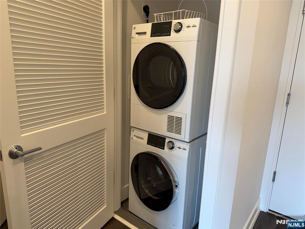 470 Main Street, Unit 412 Fort Lee, NJ 07024 - Photo 11 of 19 a utility room with dryer and washer