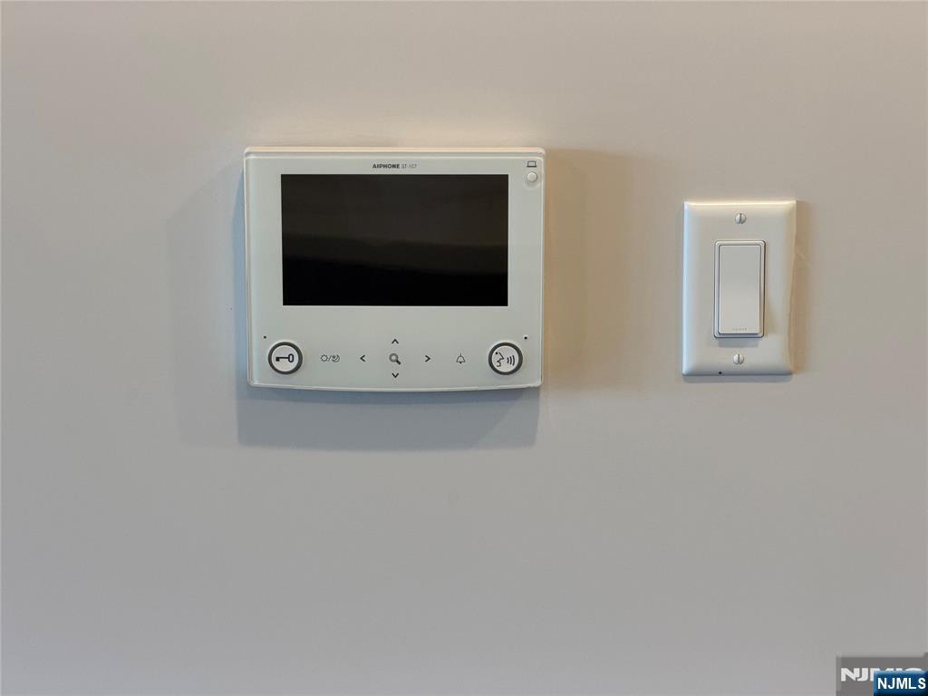 470 Main Street, Unit 412 Fort Lee, NJ 07024 - Photo 12 of 19 a picture of a microwave
