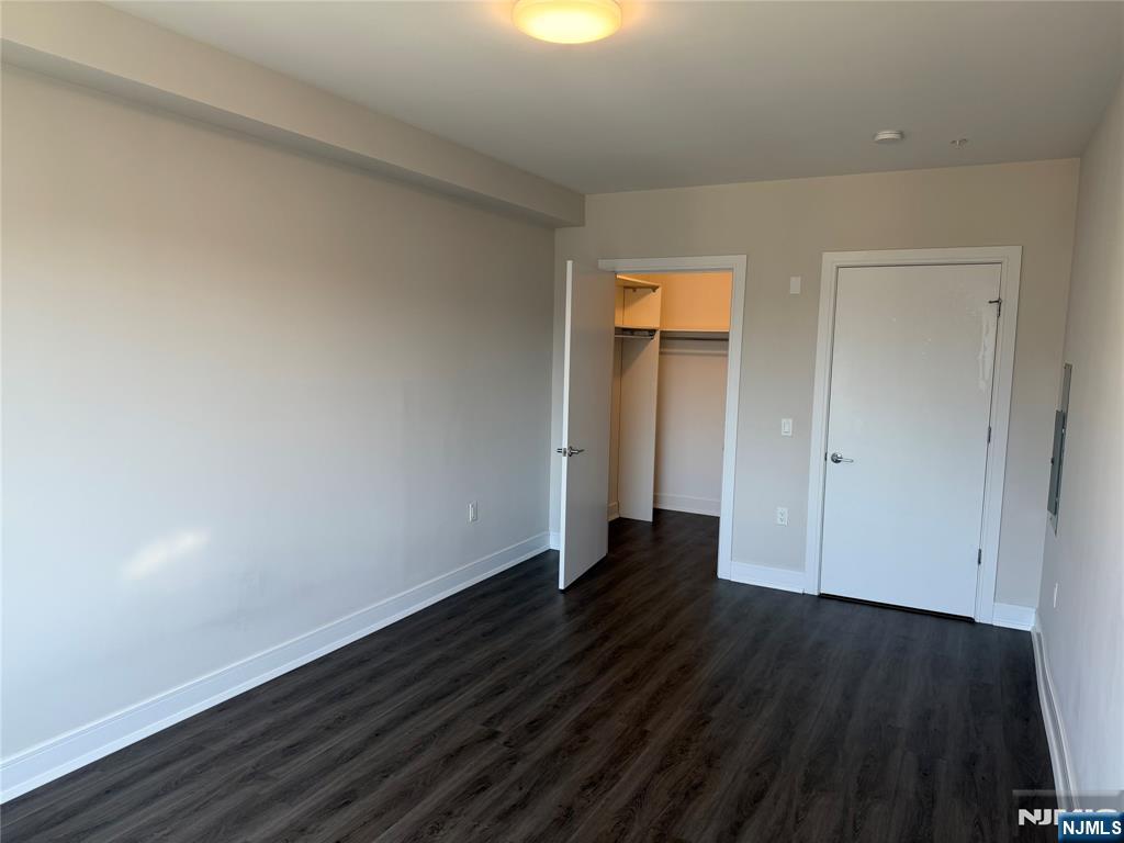 470 Main Street, Unit 412 Fort Lee, NJ 07024 - Photo 7 of 19 a view of an empty room and wooden floor