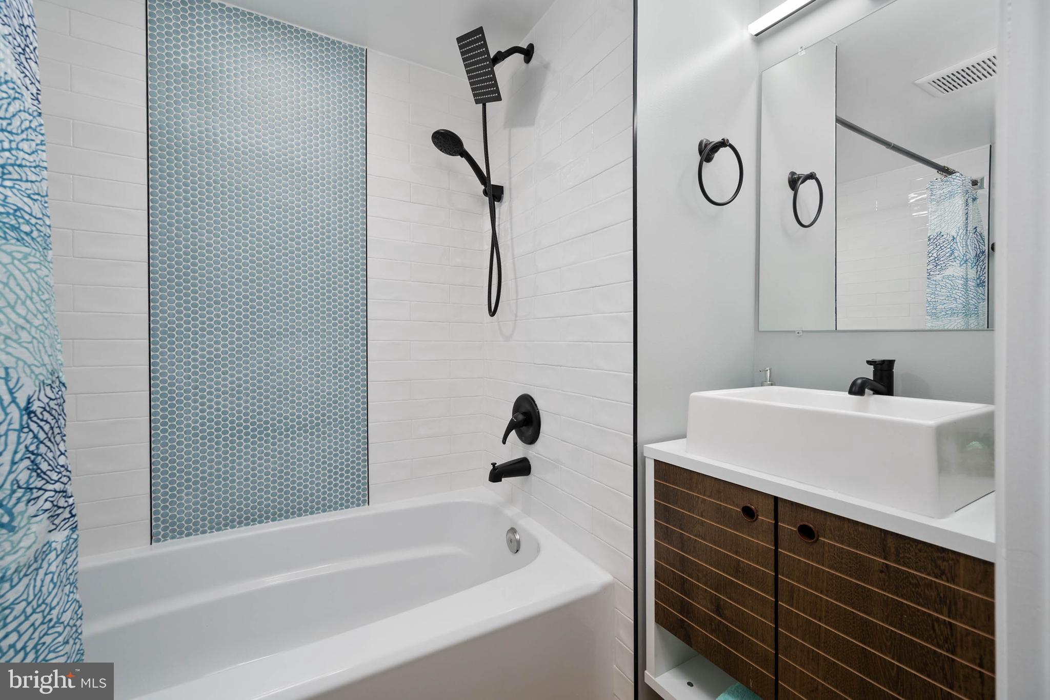 126 Skipjack Circle Berlin, MD 21811 - Photo 25 of 42 a bathroom with a bathtub and a sink