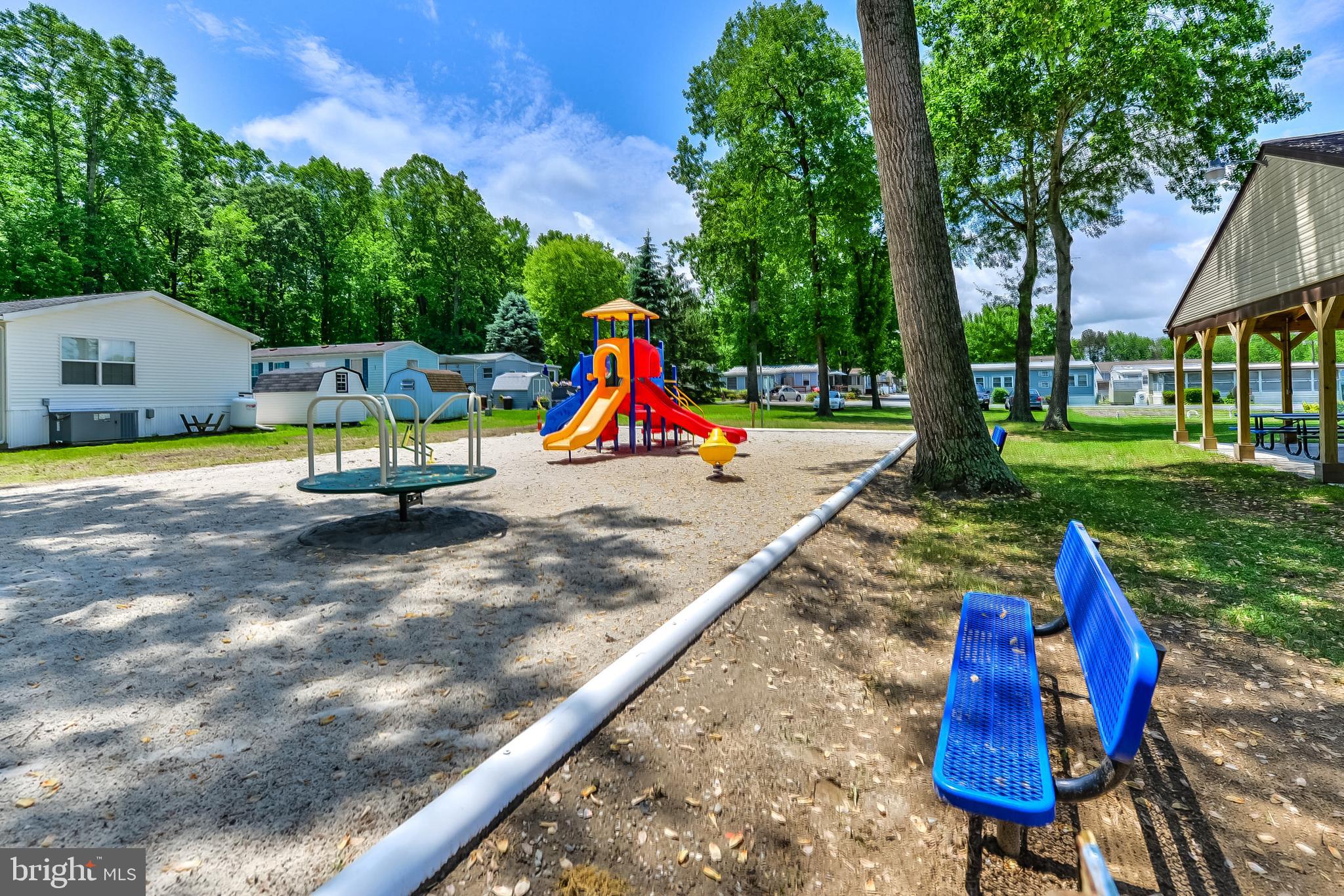 126 Skipjack Circle Berlin, MD 21811 - Photo 40 of 42 a view of playground with a slide and swing