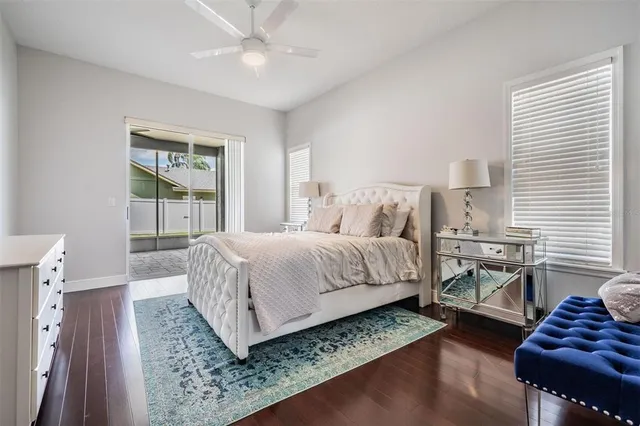 a bedroom with a bed and a couch