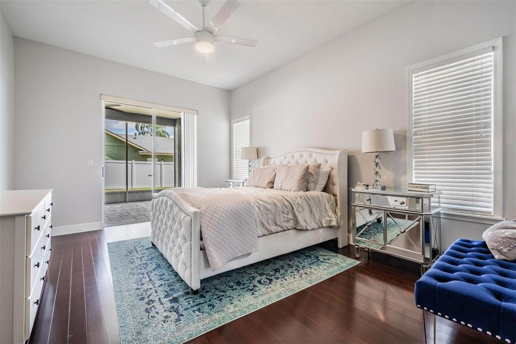 28335 Glade Fern Court Wesley Chapel, FL 33543 - Photo 31 of 44 a bedroom with a bed and a couch