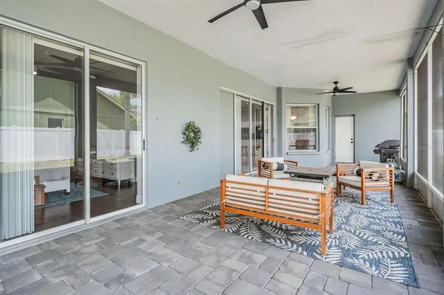 a view of dining room with furniture and window