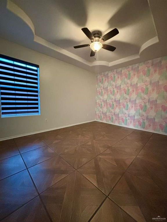 412 South 29th Street Hidalgo, TX 78557 - Photo 4 of 11 a view of an empty room with a ceiling fan