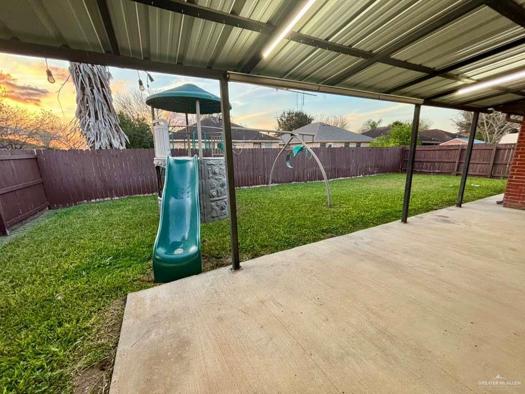 412 South 29th Street Hidalgo, TX 78557 - Photo 9 of 11 a view of a deck with a big yard