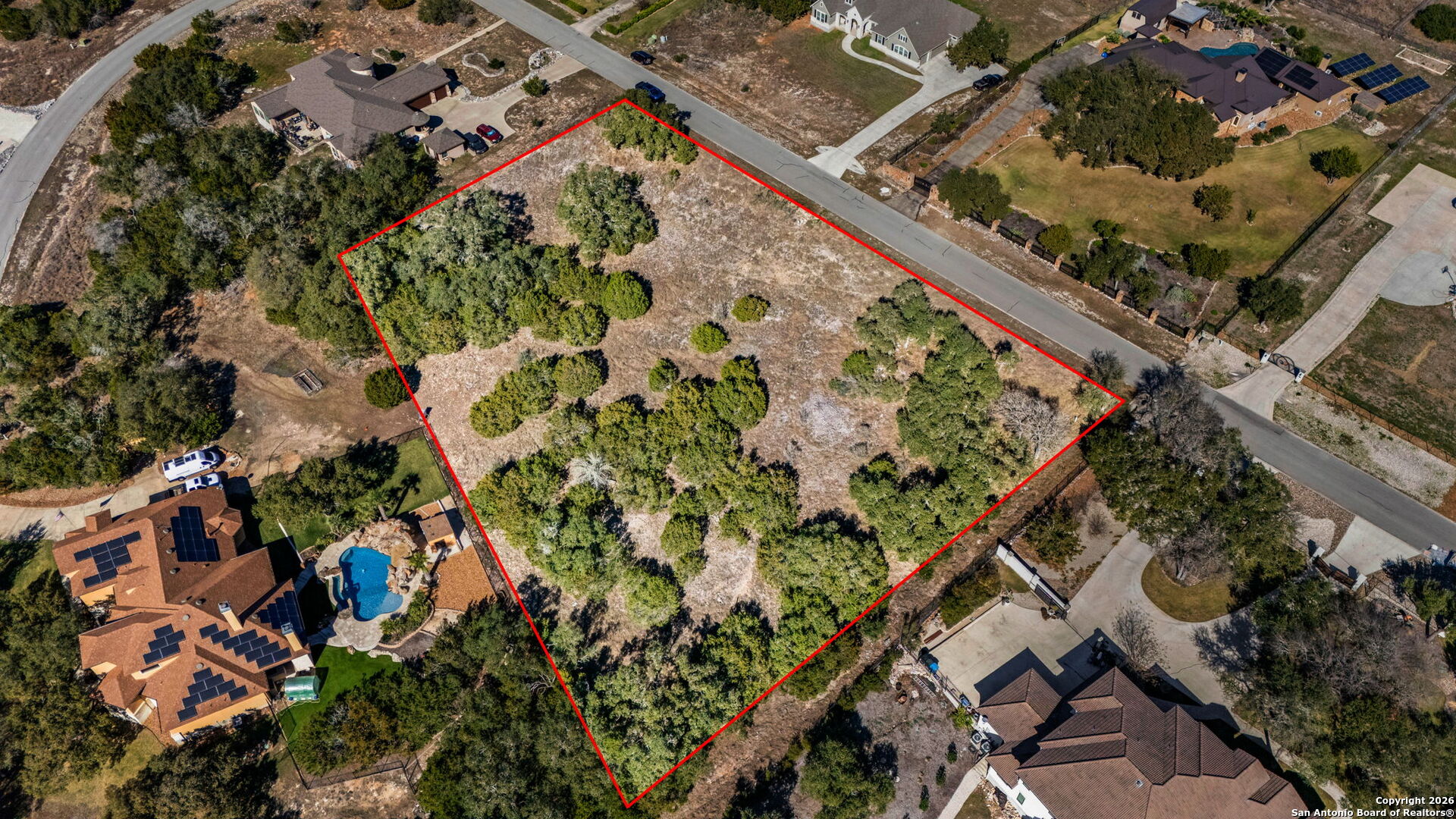 7810 Ramble Ridge San Antonio, TX 78266 - Photo 7 of 17 an aerial view of a house