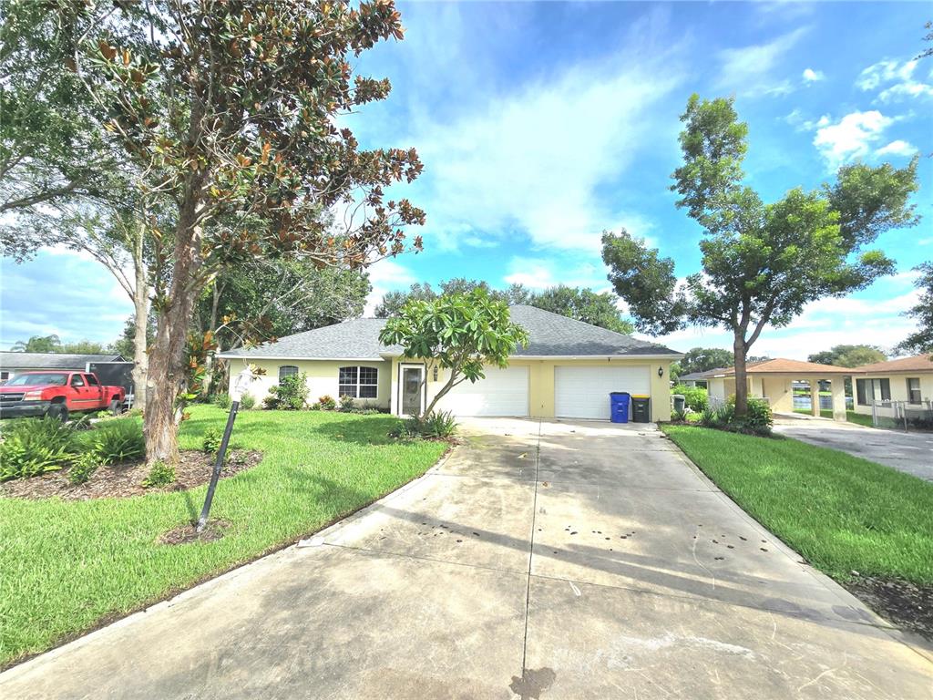 front view of a house with a yard