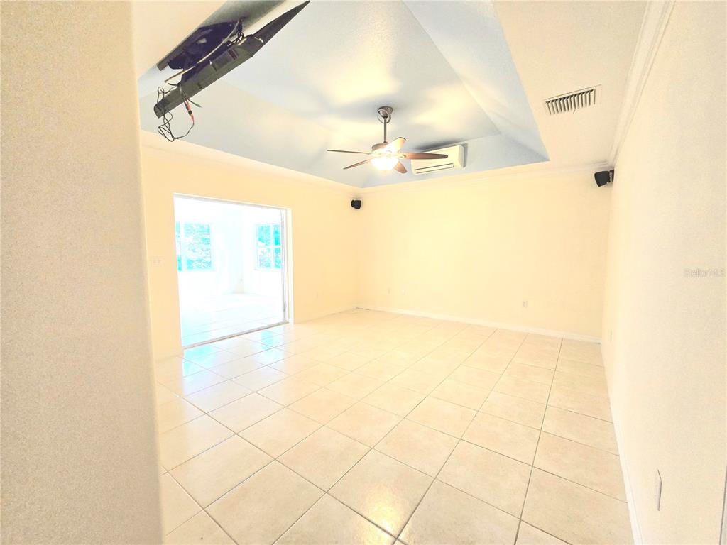 820 Shamrock Drive Sebring, FL 33875 - Photo 2 of 38 a bathroom with a sink a mirror and a shower