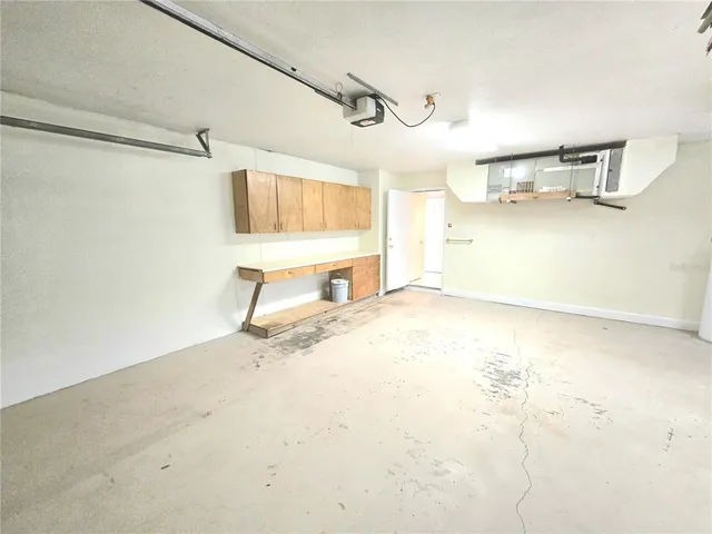 a view of a room with rack and table