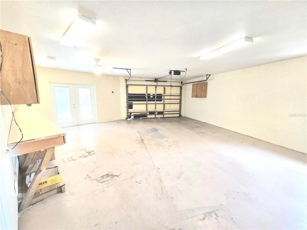 820 Shamrock Drive Sebring, FL 33875 - Photo 28 of 38 a view of a bedroom with wooden floor and windows