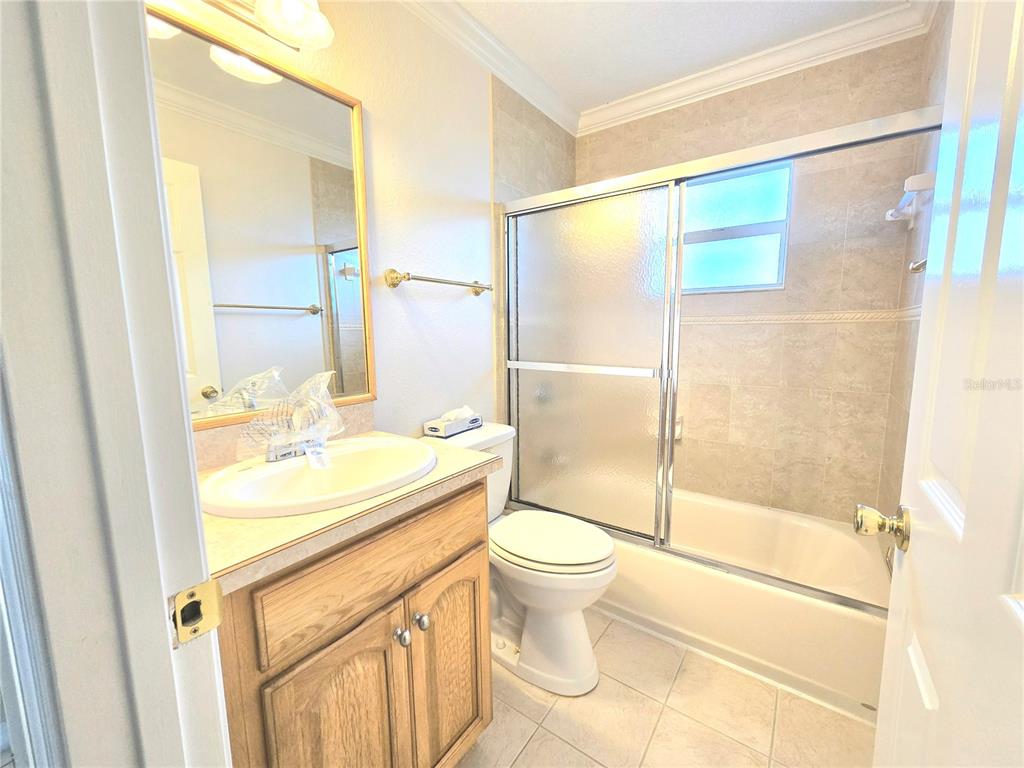 820 Shamrock Drive Sebring, FL 33875 - Photo 9 of 38 a bathroom with a sink toilet and shower