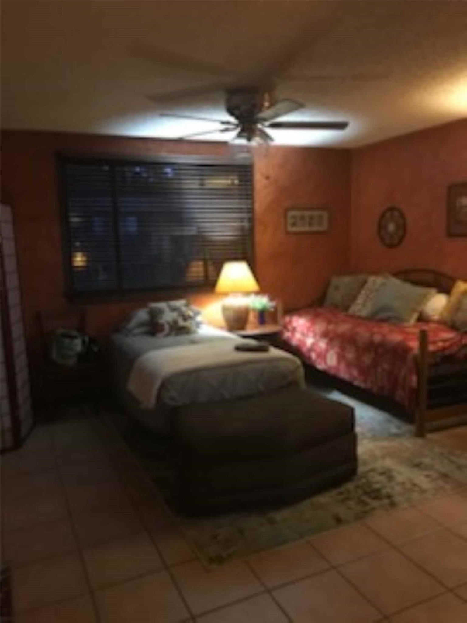 12505 Rollingwood Loop Conroe, TX 77303 - Photo 15 of 24 a bedroom with double bed and a window