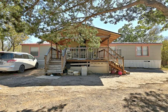 a view of a house with a patio