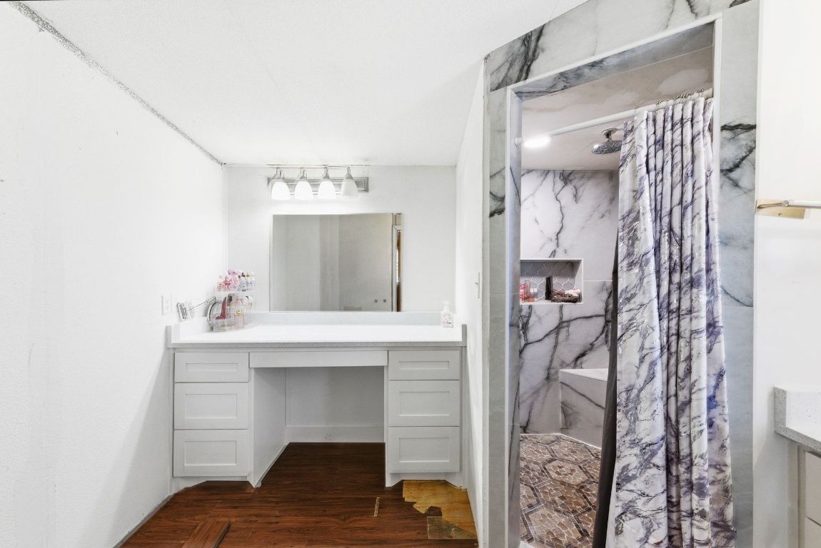1485 Pettytown Road Dale, TX 78616 - Photo 16 of 36 a living room with furniture and a chandelier