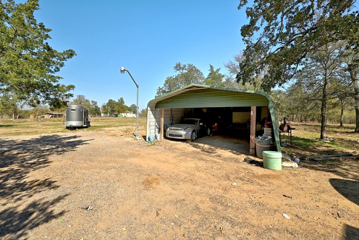 1485 Pettytown Road Dale, TX 78616 - Photo 27 of 36 a view of a two chair of the house