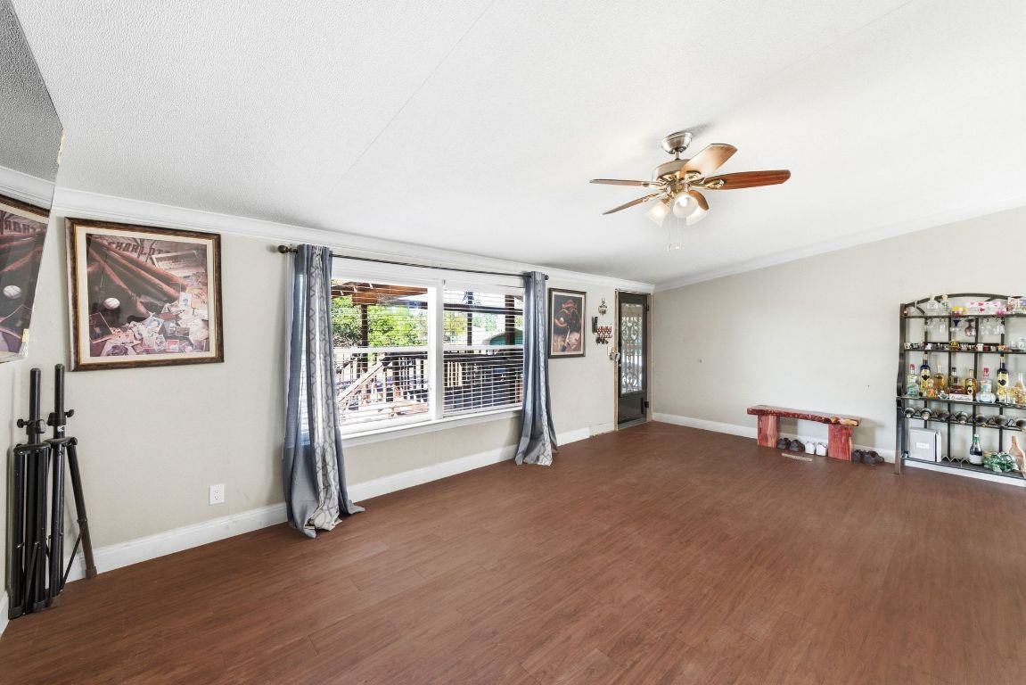 1485 Pettytown Road Dale, TX 78616 - Photo 6 of 36 a view of an empty room with a window