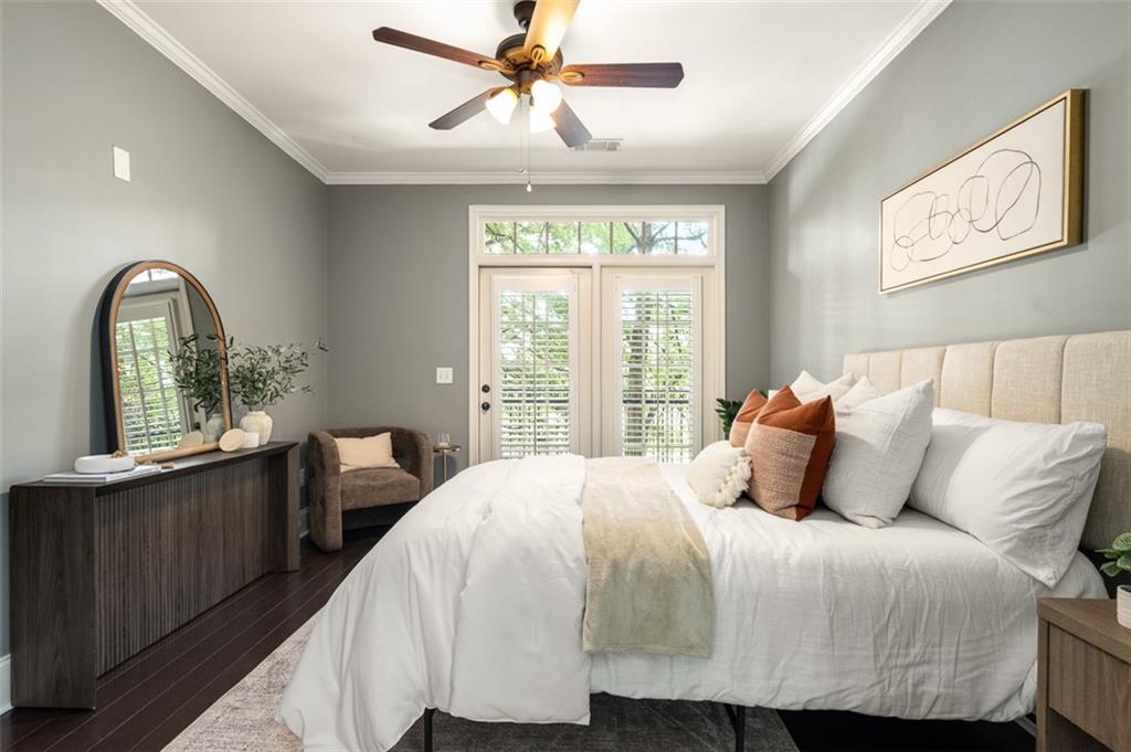 825 Highland Lane Northeast, Unit 1112 Atlanta, GA 30306 - Photo 18 of 39 a bedroom with a bed and a window