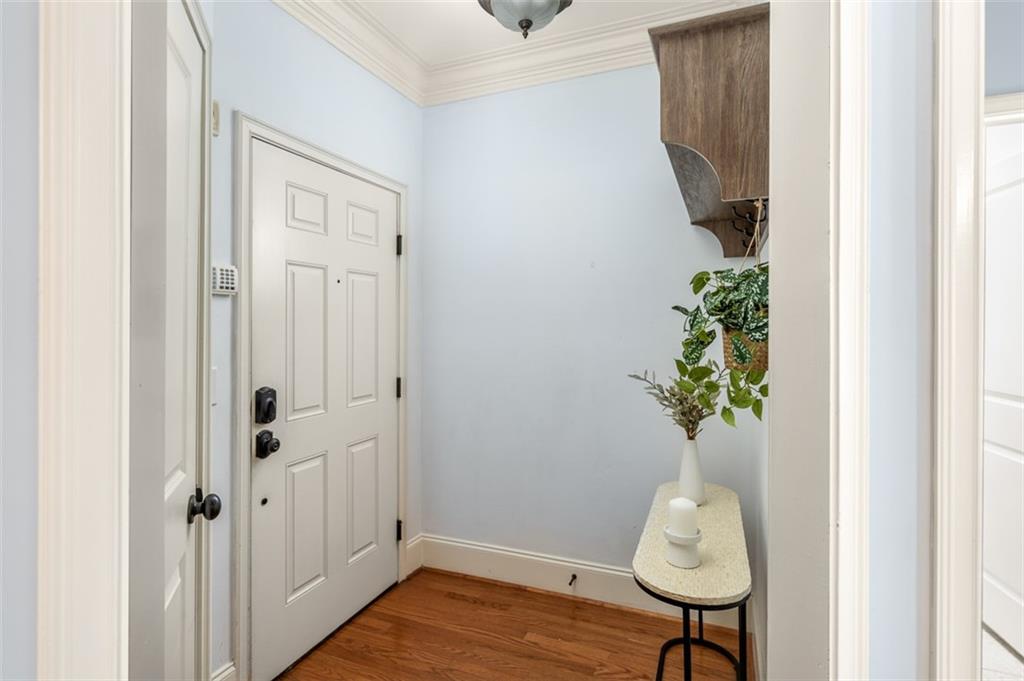 825 Highland Lane Northeast, Unit 1112 Atlanta, GA 30306 - Photo 2 of 39 a house that has a potted plant on it