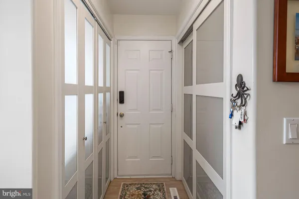 a bathroom with a shower and a sink