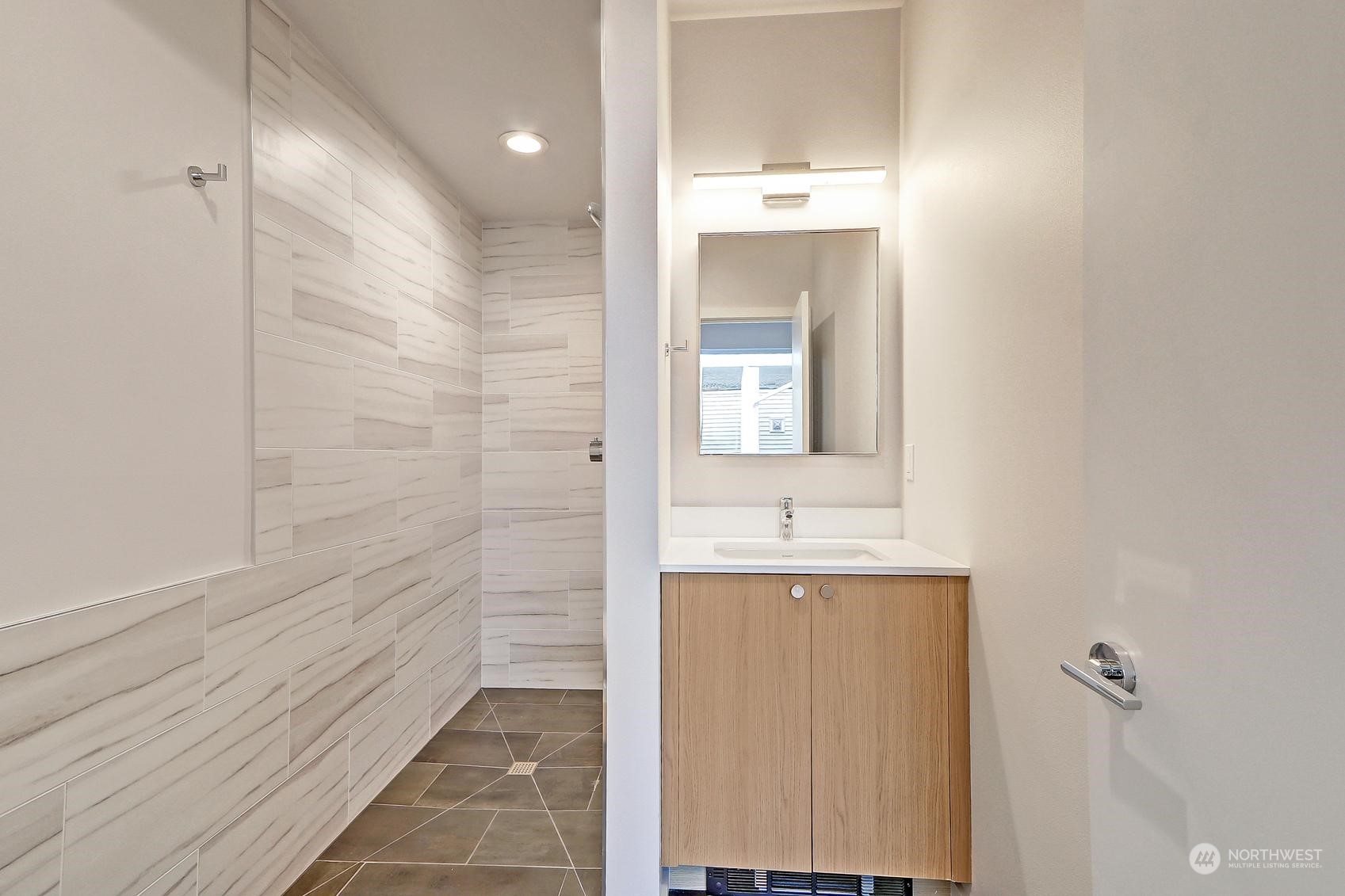 17342 Bothell Way Northeast, Unit H Bothell, WA 98011 - Photo 14 of 19 a bathroom with a mirror and a sink