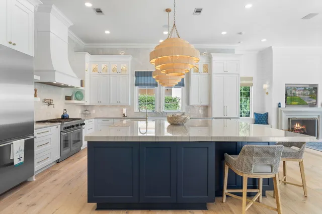 a storage room with cabinets and wooden floor