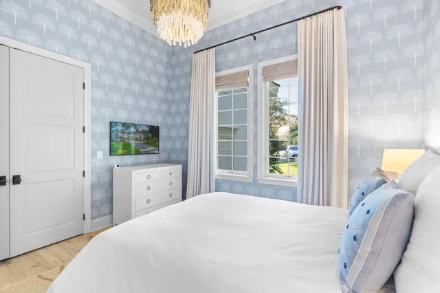 a view of a patio with chairs and a yard