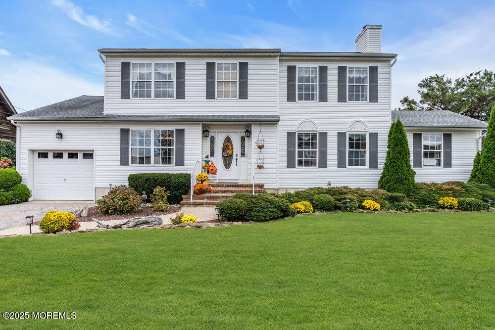 3 Harbor View Lane Toms River, NJ 08753 - Photo 3 of 61 a front view of a house with garden and porch
