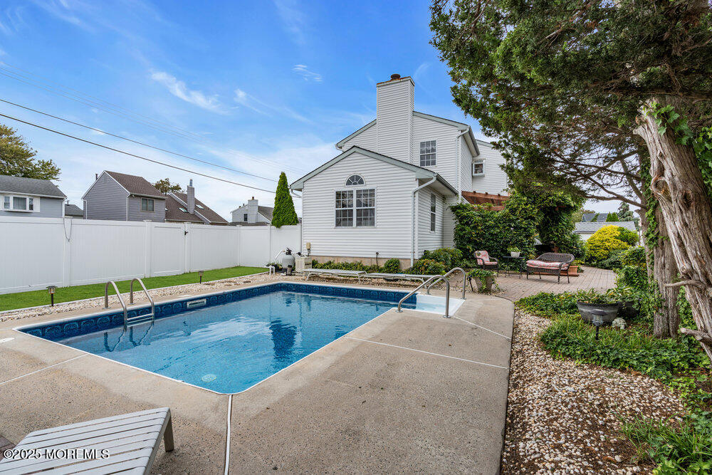 3 Harbor View Lane Toms River, NJ 08753 - Photo 47 of 61 a view of a house with pool and chairs
