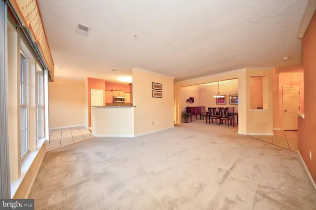 a view of a livingroom with furniture and furniture