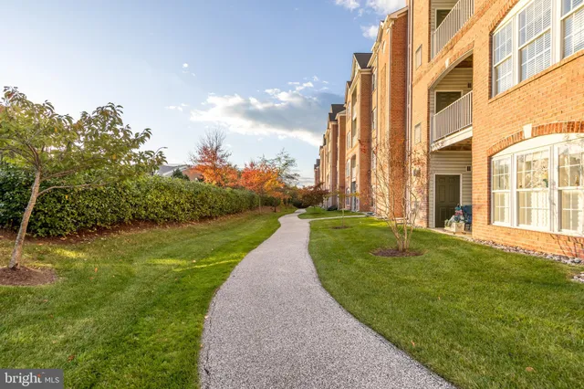 a view of a building with a yard