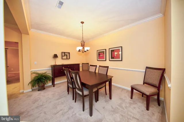 a view of a livingroom with furniture and window
