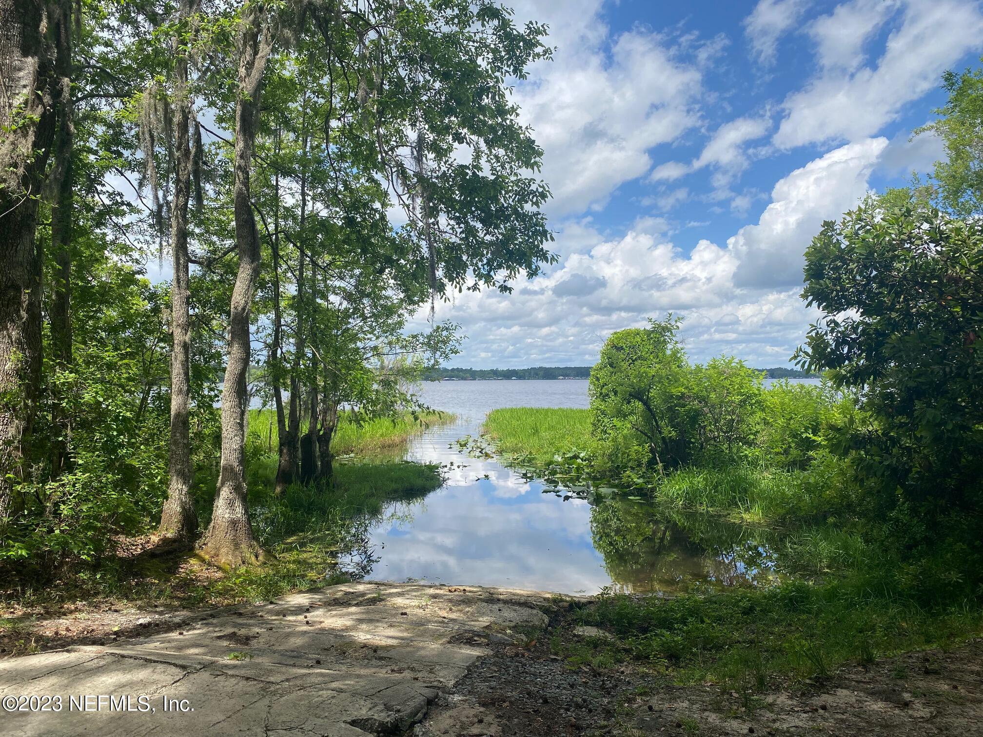 102 Sculpin Drive Florahome, FL 32140 - Photo 14 of 21 a view of a pathway of a park