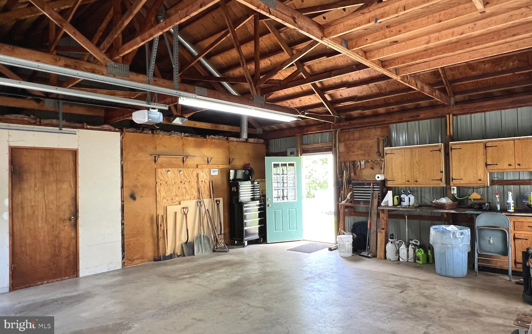 562 Headquarters Road Ottsville, PA 18942 - Photo 38 of 44 Garage interior with additional workspace
