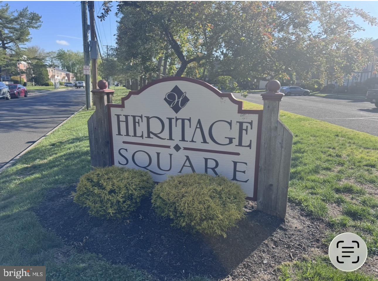 33 Chelsea Circle Clementon, NJ 08021 - Photo 6 of 6 a view of a street sign under a large tree