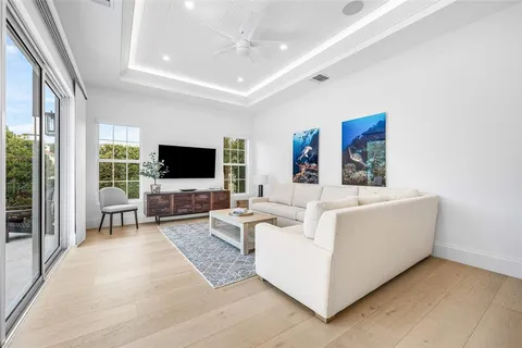 a bathroom with a double vanity sink mirror and a shower
