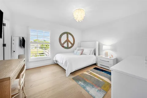 a view of a house with backyard porch and furniture