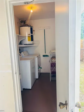 a view of a bathroom from a hallway