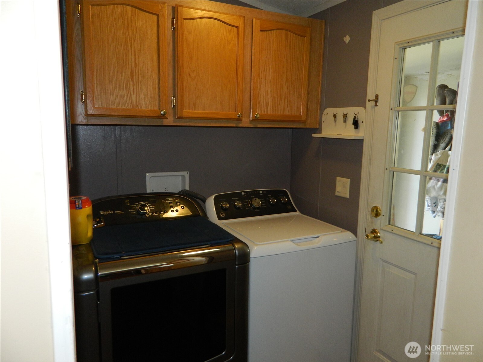 28 Ridgeline Road Tonasket, WA 98855 - Photo 11 of 19 a utility room with dryer and washer